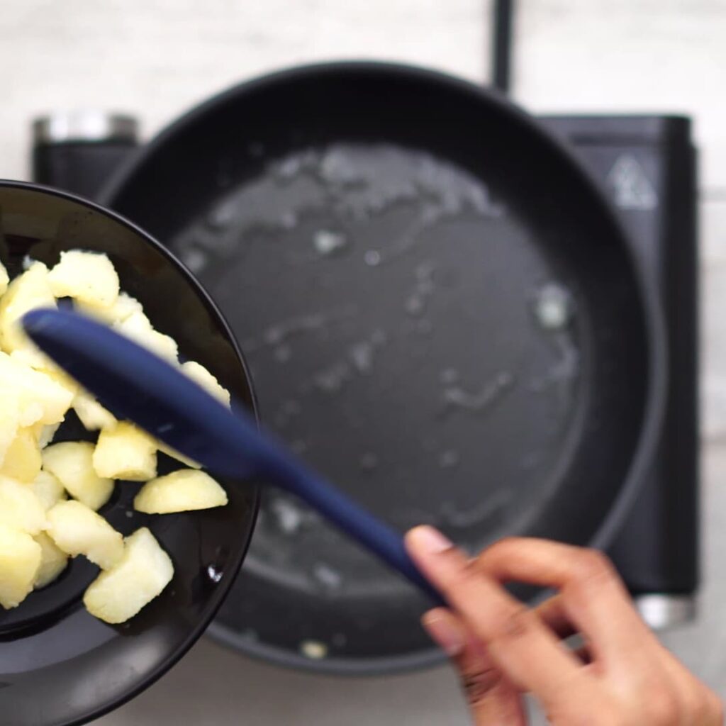 Removing potato from pan