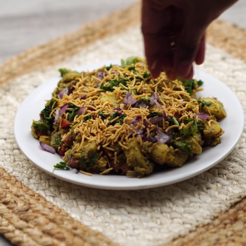 topping aloo chaat with sev