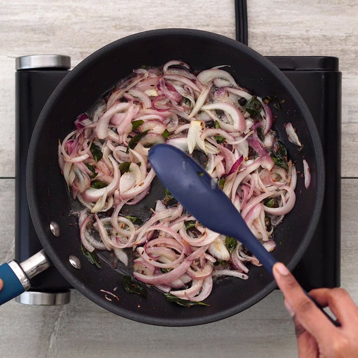 Adding onion and sautéing