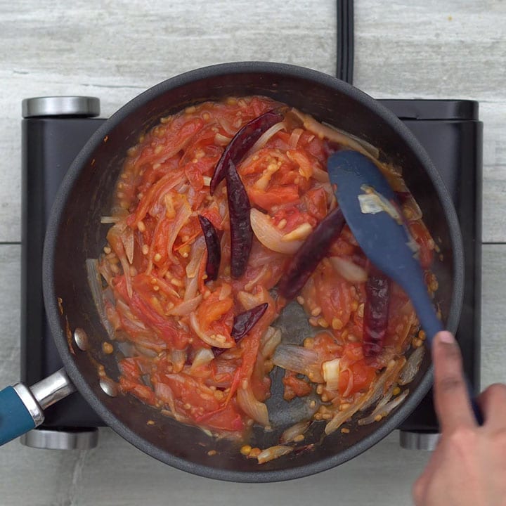 Adding tomato and sautéing