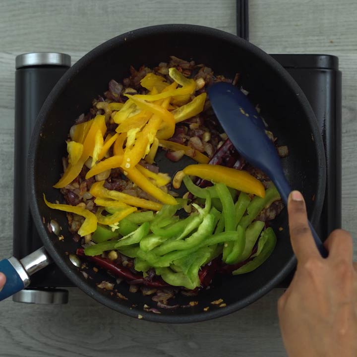 stir frying the bell peppers