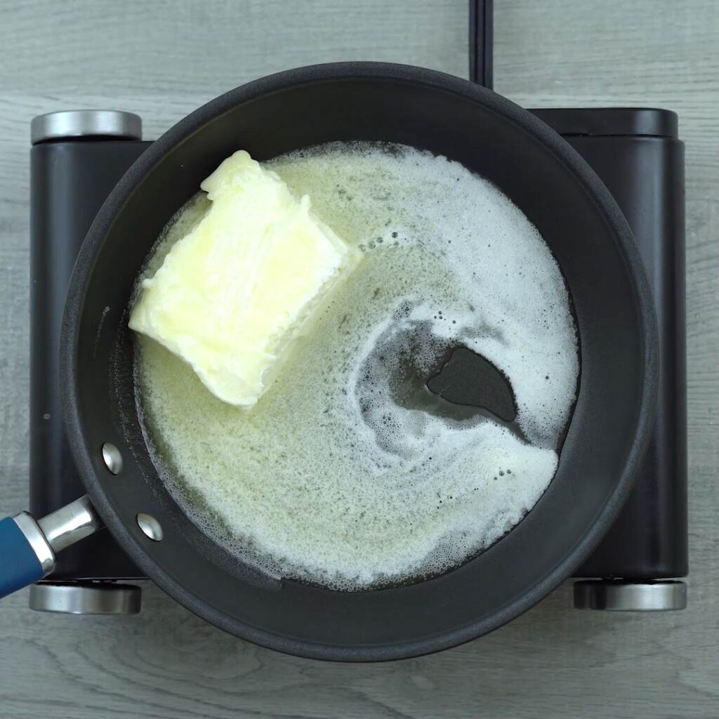 butter is melting in a pan