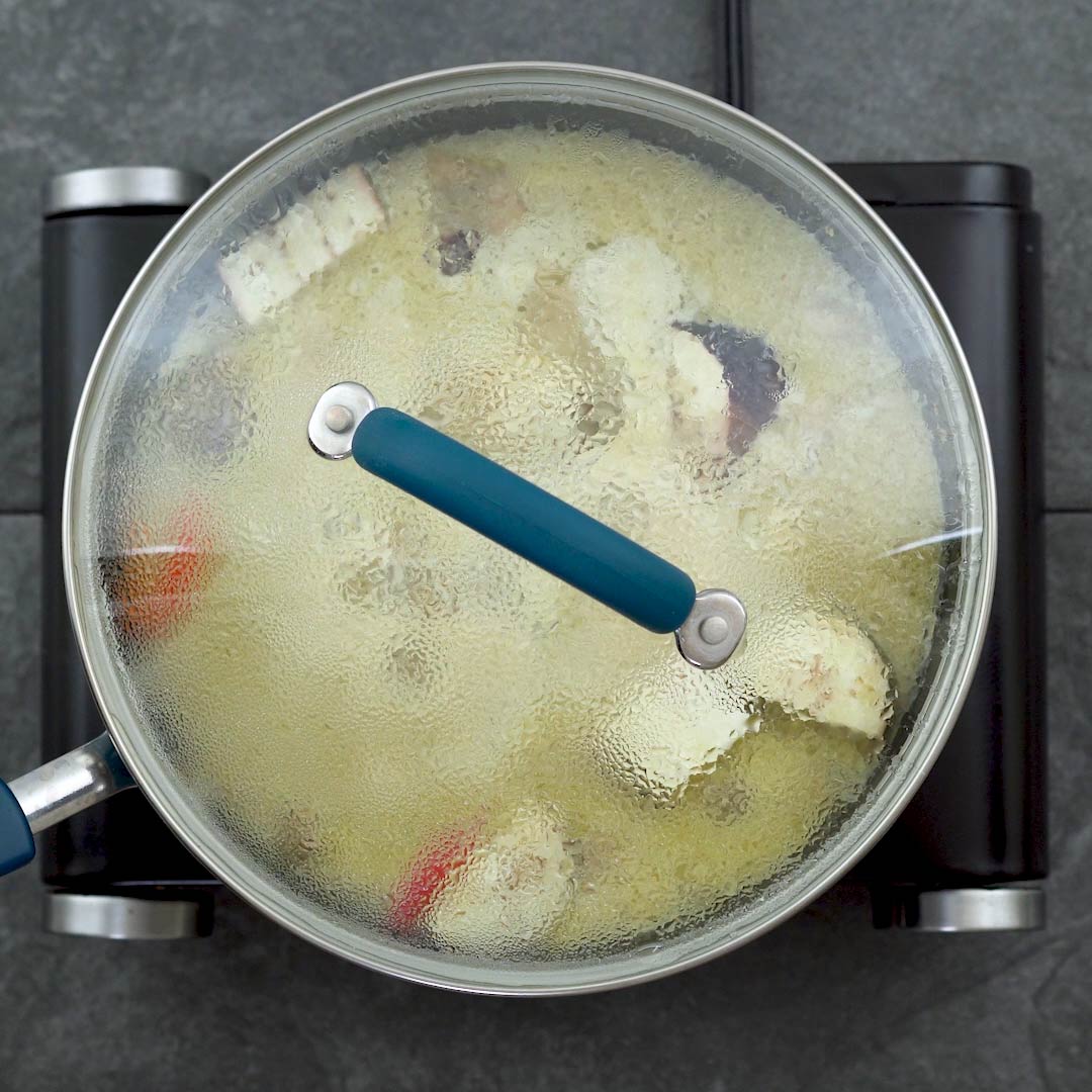 cooking the green curry mixture with lid closed