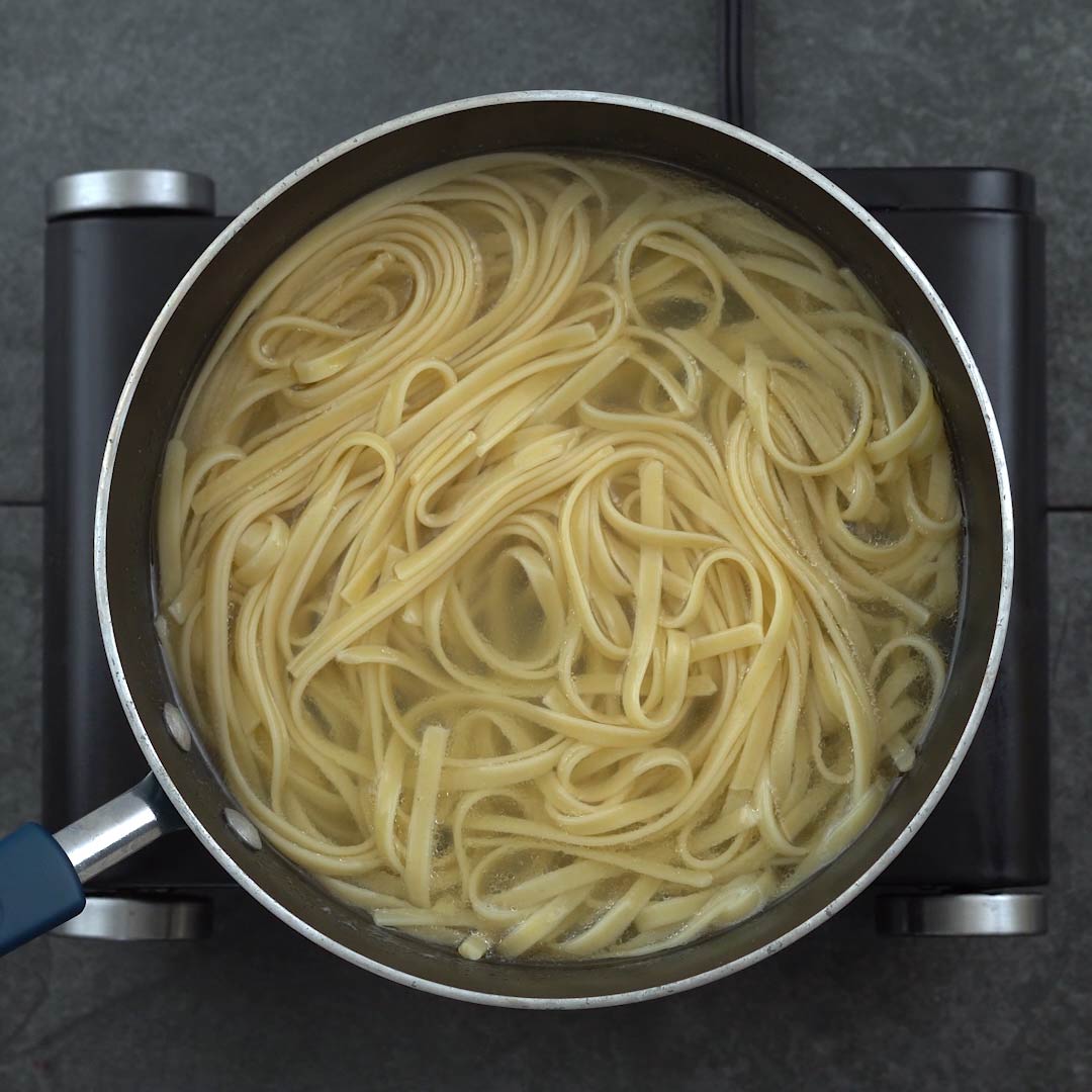 cooked pasta in boiling water
