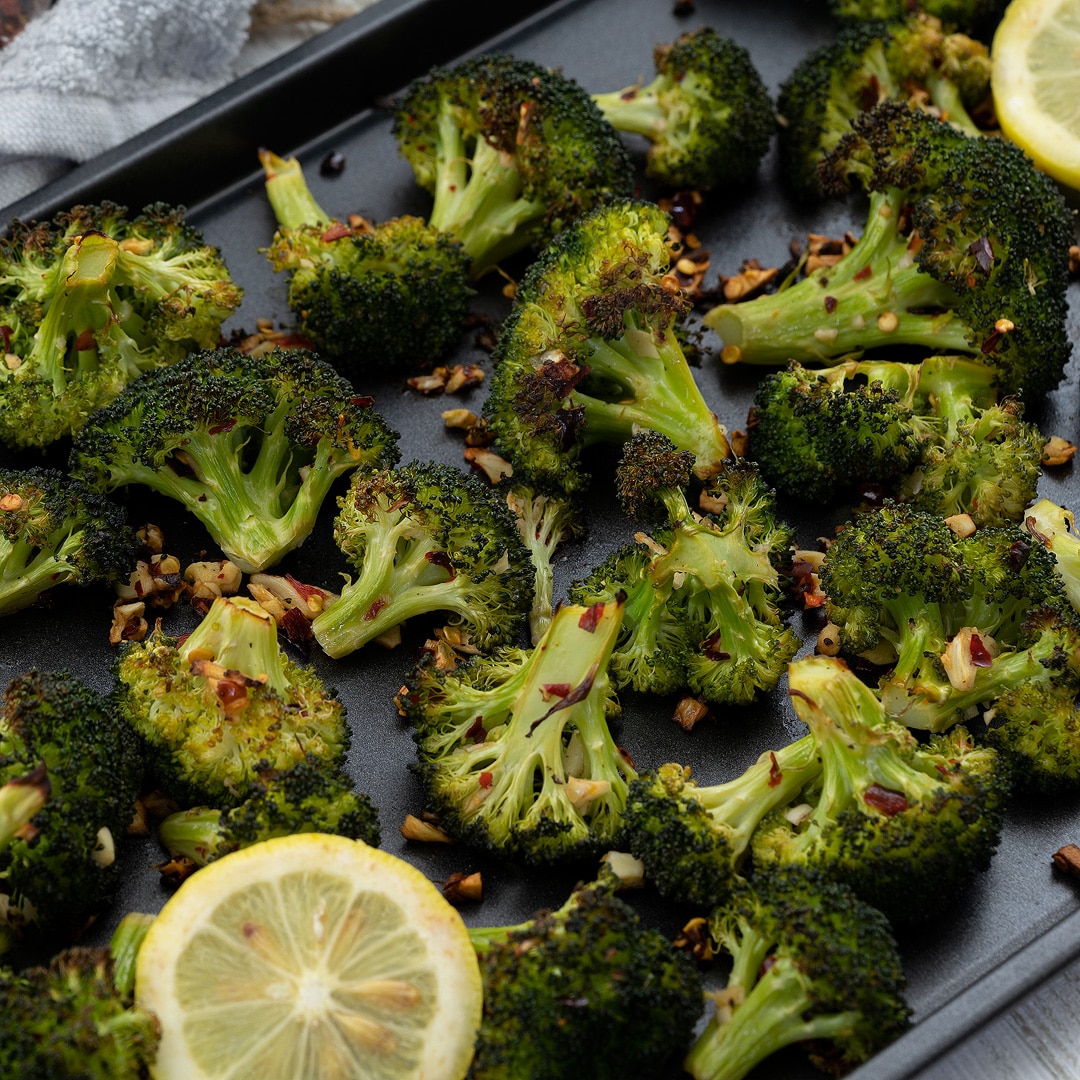 Roasted Broccoli is served with lemon
