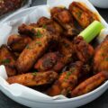 Air fried chicken wings in a serving bowl