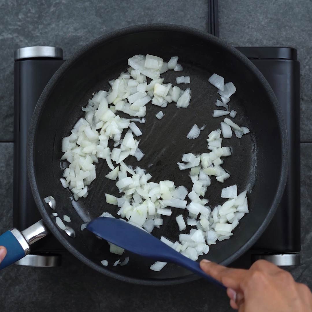 Sauteing onion in a pan