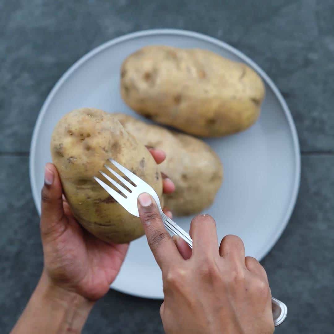 Poking the Potatoes with fork