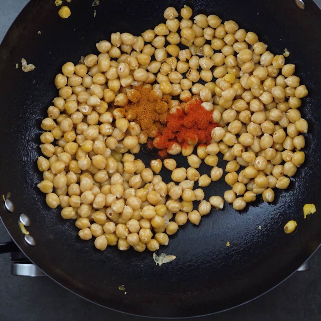 Seasoning the Chickpeas in a pan
